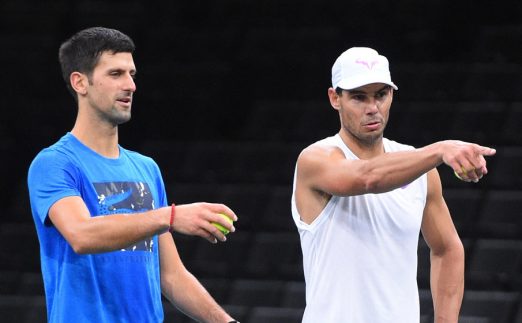 Novak Djokovic. and Rafael Nadal pointing