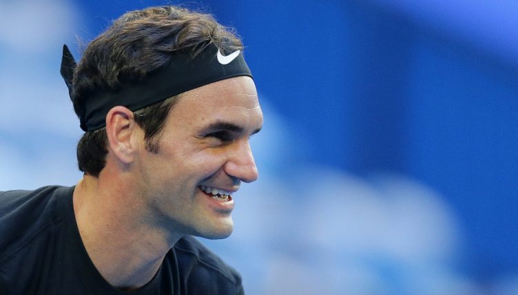 Roger Federer looks on