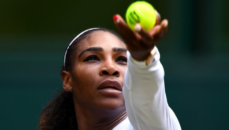 Serena Williams serves