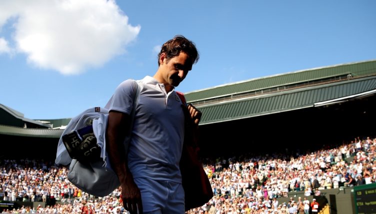 Roger Federer walks off disappointed at Wimbledon