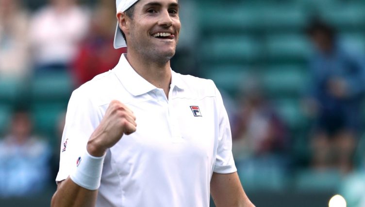 John Isner celebrates