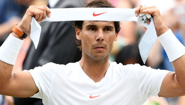 Rafael Nadal changes his headband