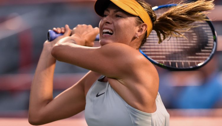 Maria Sharapova plays a shot