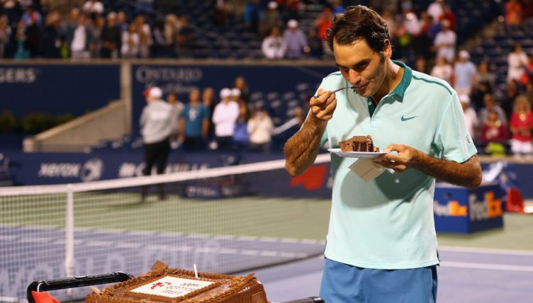 Roger Federer eating cake