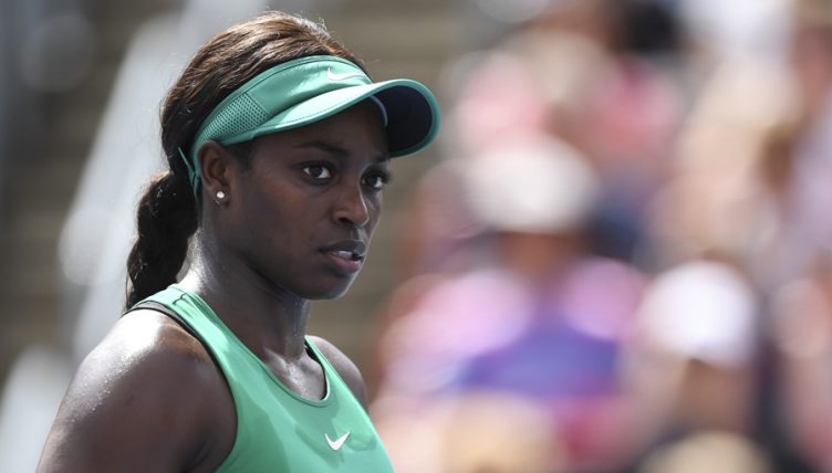Sloane Stephens looks on