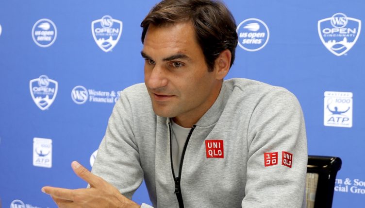 Roger Federer talking to the media