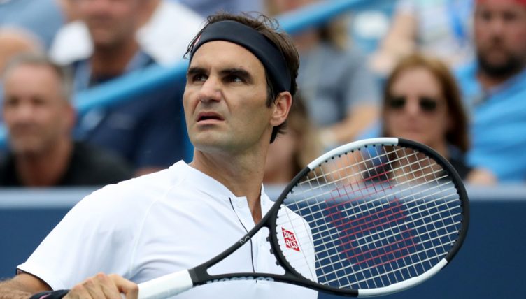Roger Federer watches on