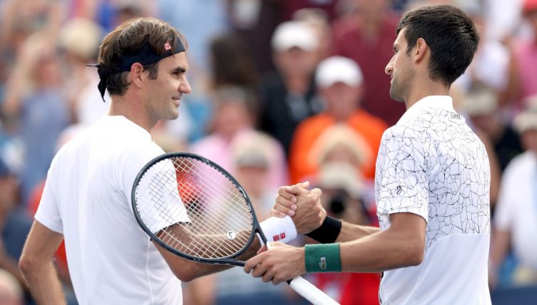 Roger Federer and Novak Djokovic shaking hands