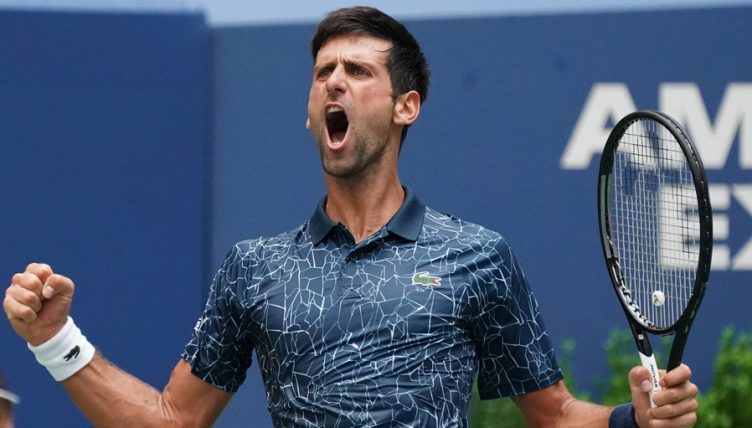 Novak Djokovic celebrates at US Open