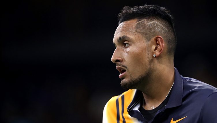 Nick Kyrgios looks on