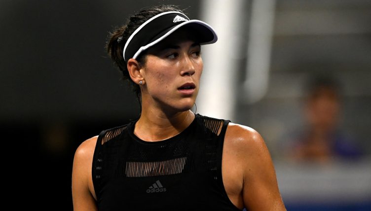 Garbine Muguruza looks on