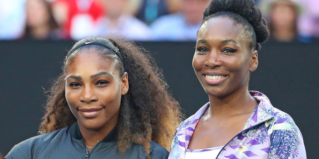 Serena Williams and Venus Williams posing