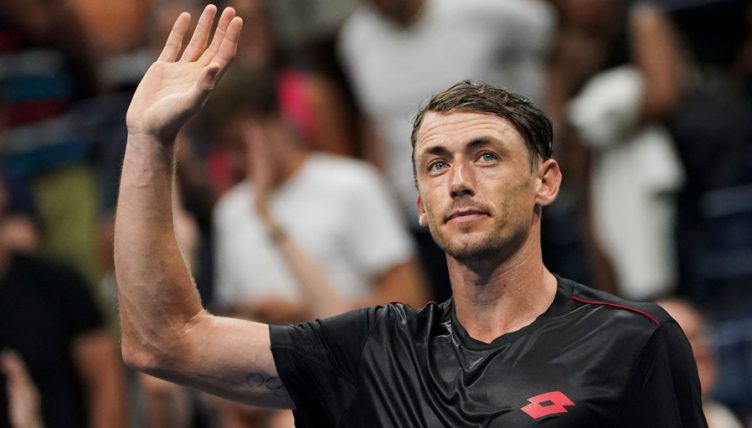 John Millman celebrates