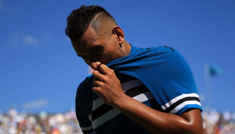 Nick Kyrgios looking down
