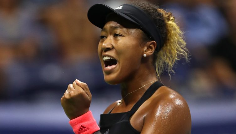 Naomi Osaka celebrates