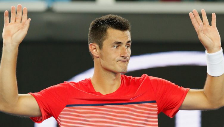 Bernard Tomic arms up
