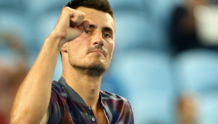 Bernard Tomic celebrates