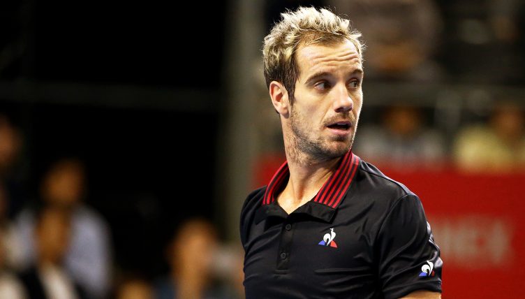 Richard Gasquet looks on