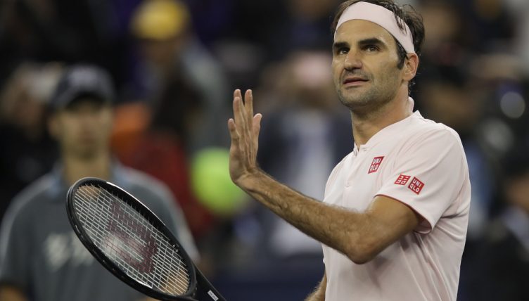 Roger Federer celebrates