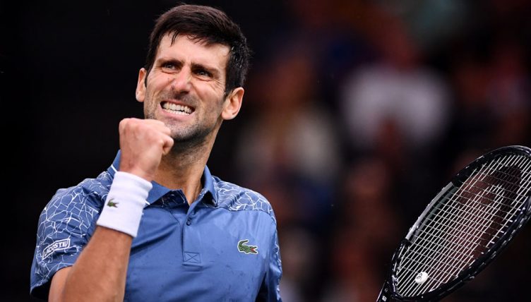 Novak Djokovic celebrates at Paris Masters