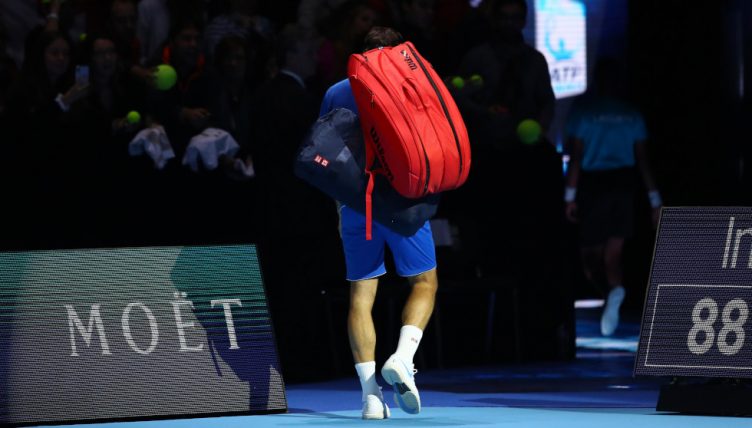 Roger Federer leaves the court