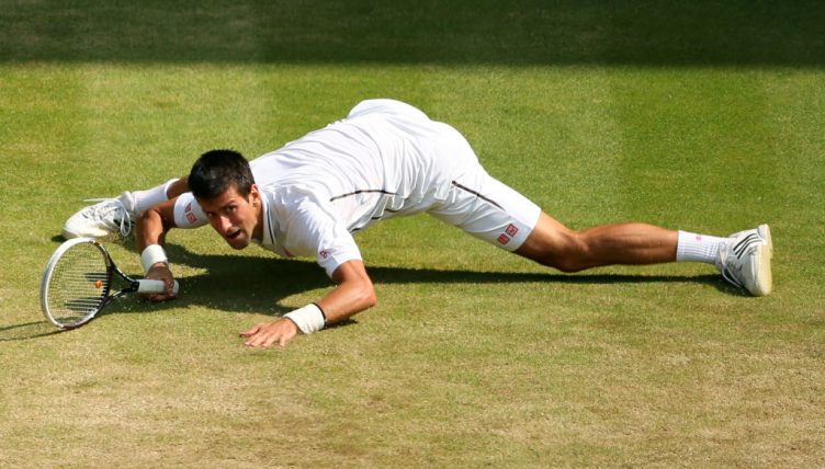 Novak Djokovic sliding