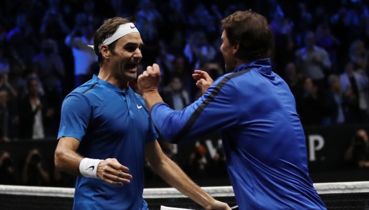 Roger Federer and Rafael Nadal celebrate
