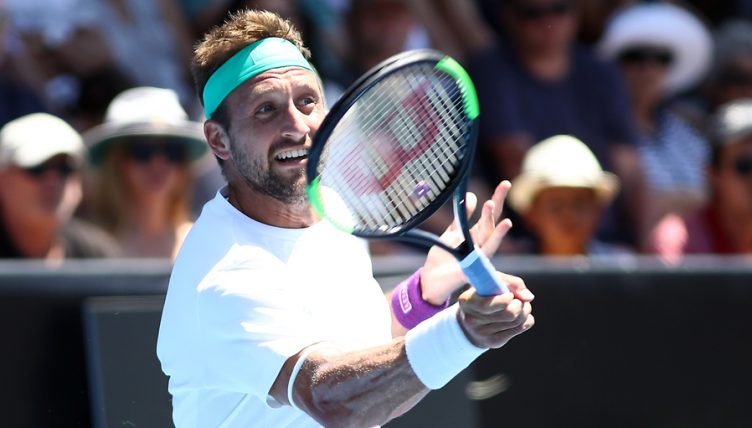 Tennys Sangren during match with Cameron Norrie