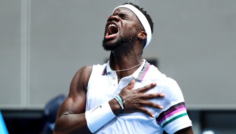 Frances Tiafoe celebrates