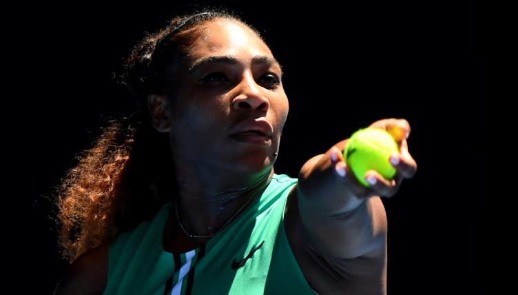 Serena Williams serves at Australian Open