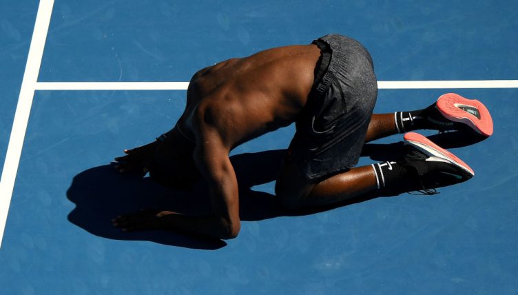 Frances Tiafoe celebrates