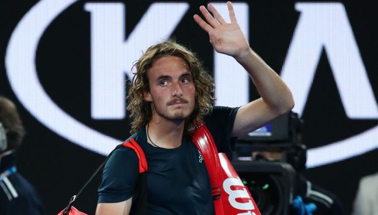 Stefanos Tsitsipas waves goodbye