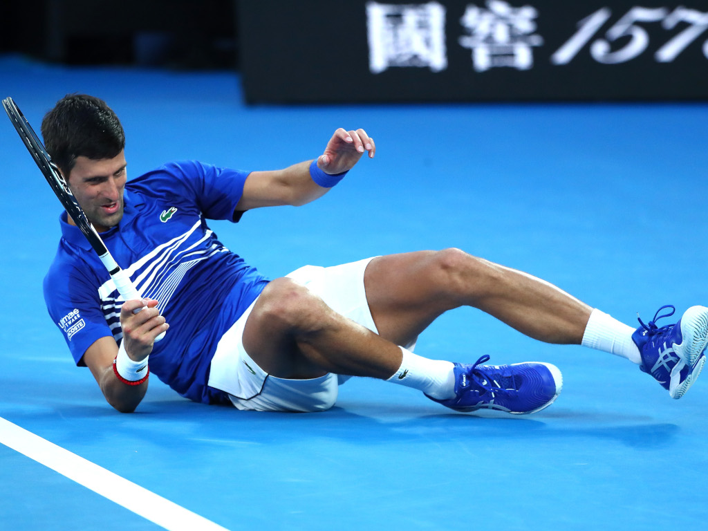 Novak Djokovic takes a tumble