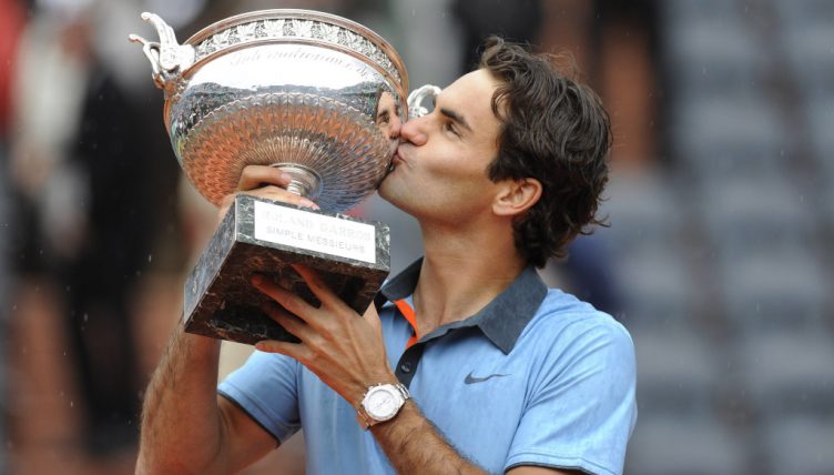 Roger Federer with 2009 French Open trophy