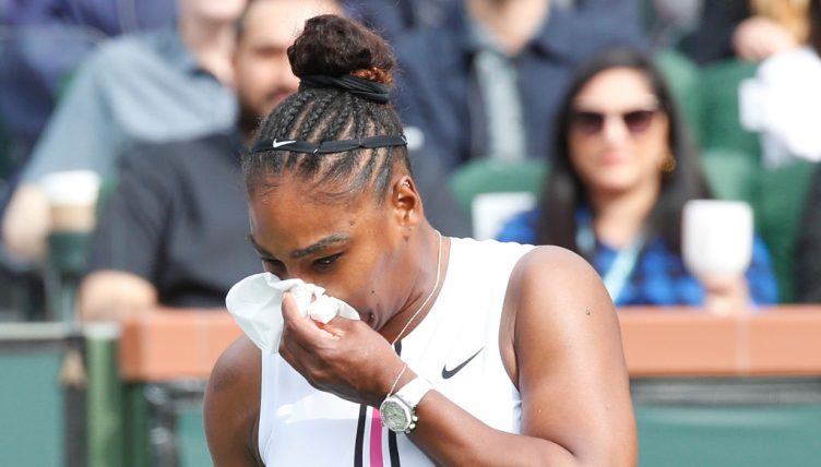 Serena Williams blowing her nose