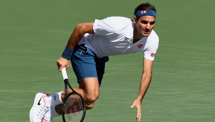 Roger Federer in action PA