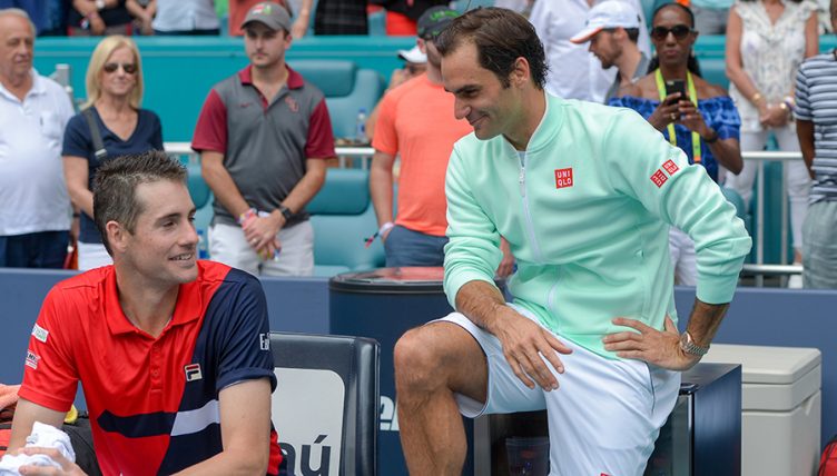 Roger Federer with John Isner after Miami Open final PA