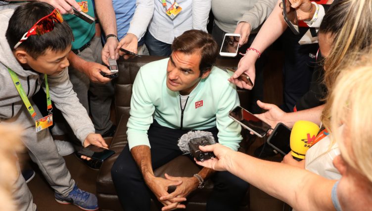 Roger Federer talking to the media