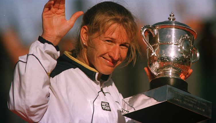 Steffi Graf with French Open trophy PA