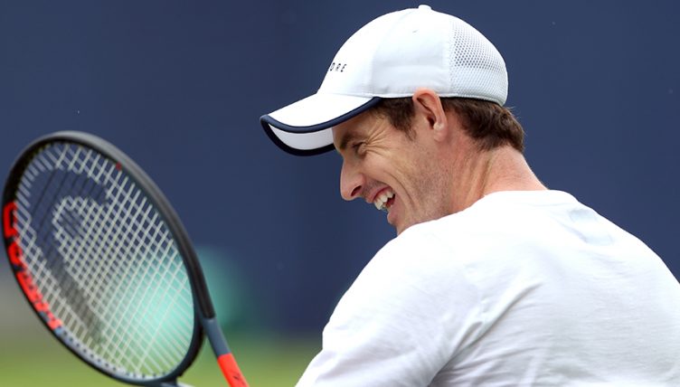 Andy Murray smiling at Queen's practice PA