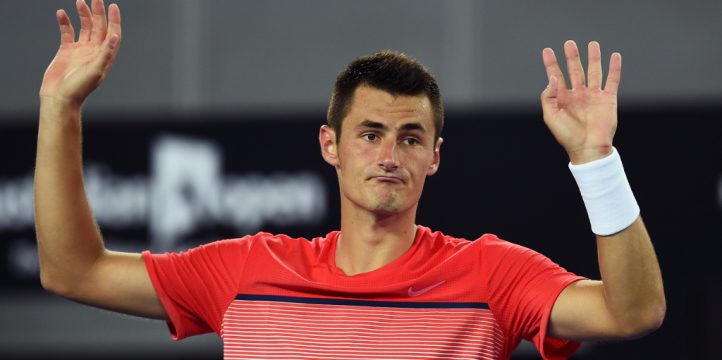 Bernard Tomic hands up