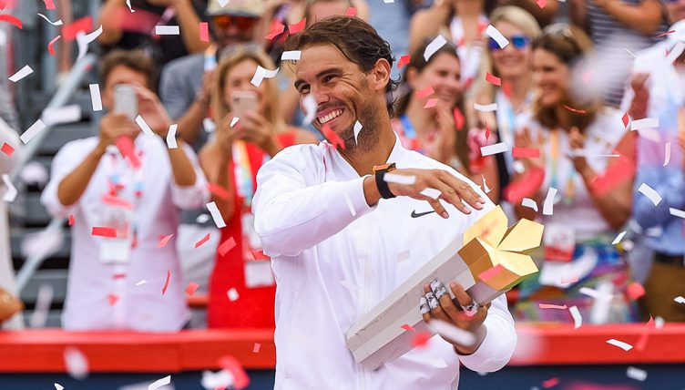 Rafael Nadal celebrates winning Rogers Cup
