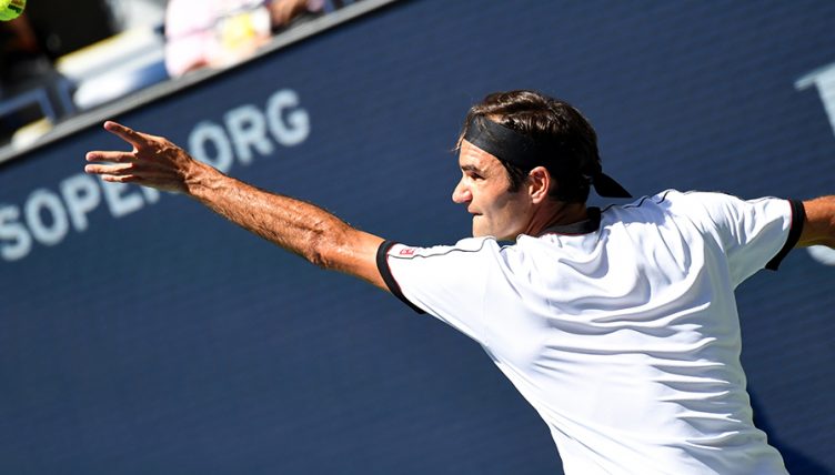 Roger Federer serving at US Open