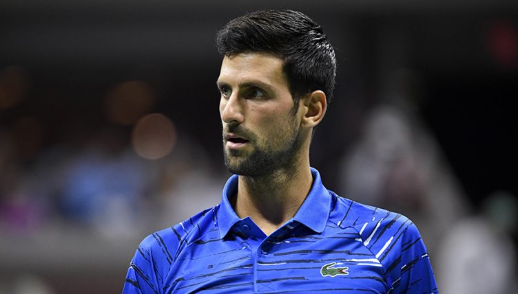 Novak Djokovic looks on at US Open
