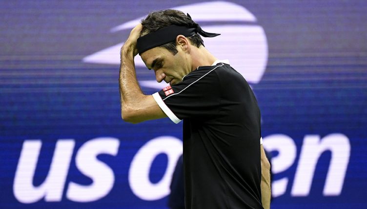 Roger Federer looking down at US Open