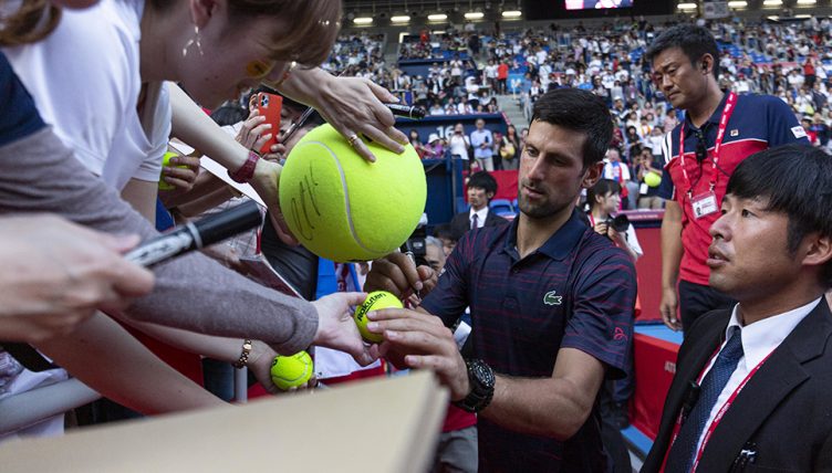 Novak Djokovic swamped in Tokyo
