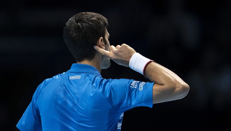 Novak Djokovic cups ear to London crowd