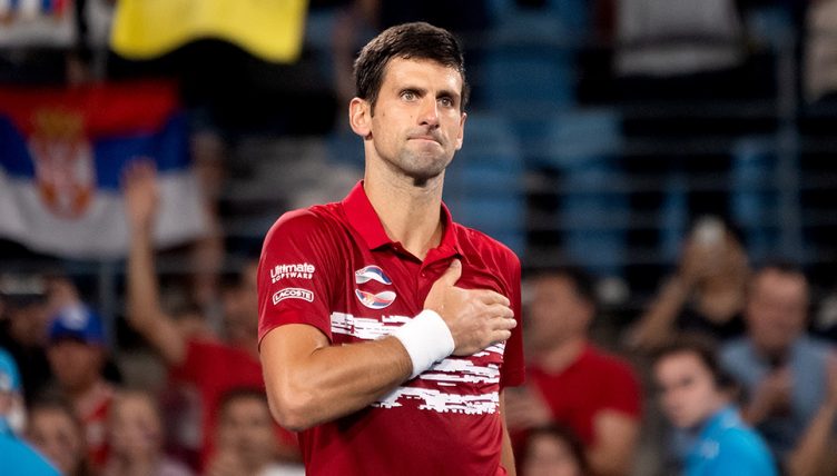 Novak Djokovic with hand on heart