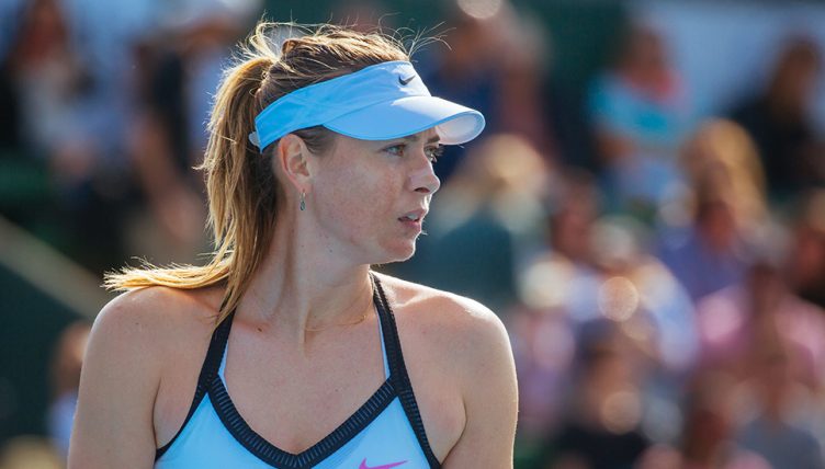 Maria Sharapova looking on