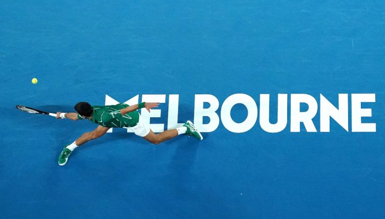 Novak Djokovic sliding